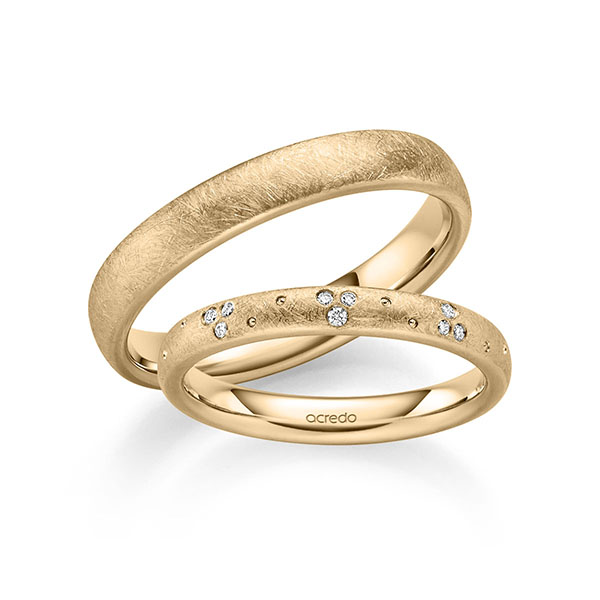 Set klassieke trouwringen in roségoud 14 kt. met in totaal 0,054 ct. Briljant tw/si van acredo
