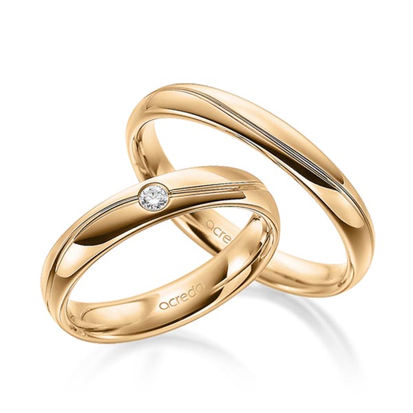 Set Klassieke trouwringen in roségoud 14 kt. met in totaal 0,05 ct. Briljant tw/si van acredo