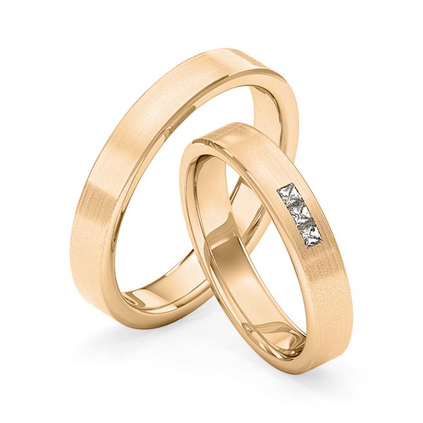Set klassieke trouwringen in roségoud 14 kt. met in totaal 0,09 ct. Princess-Diamant tw,vs van Merii