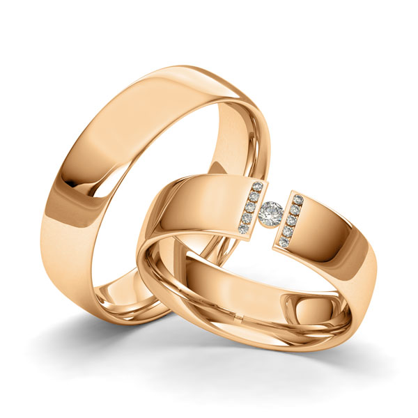 Set klassieke trouwringen in roségoud 14 kt. met in totaal 0,1 ct. Briljant tw/si van Merii