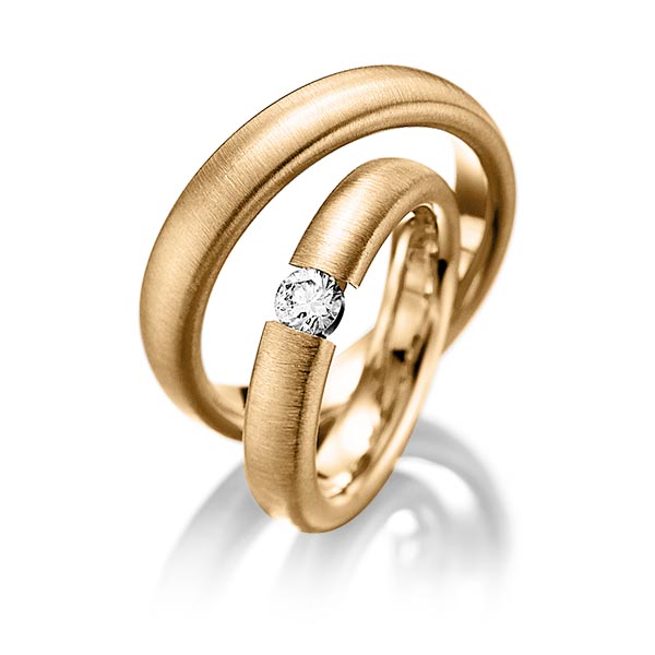 Set klassieke trouwringen in roségoud 14 kt. met in totaal 0,25 ct. Briljant tw/si van Eternal Touch