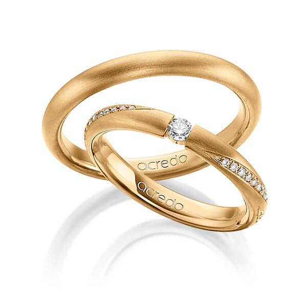 Set klassieke trouwringen in roségoud 18 kt. met in totaal 0,325 ct. Briljant r,if tw/si van acredo