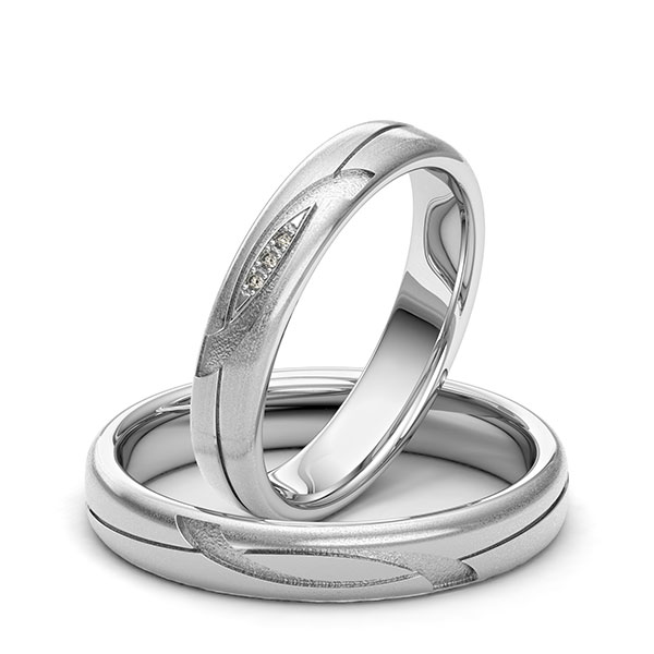 Set klassieke trouwringen in witgoud 14 kt. Laser Structuur met in totaal 0,015 ct. Briljant tw/si van Eternal Touch