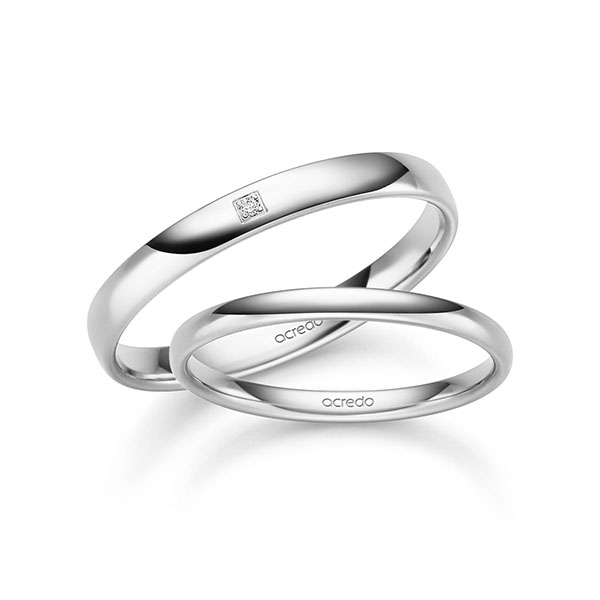 Set klassieke trouwringen in witgoud 14 kt. met in totaal 0,008 ct. Briljant tw/si van acredo