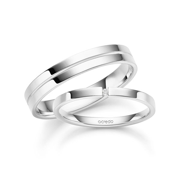 Set klassieke trouwringen in witgoud 14 kt. met in totaal 0,008 ct. Briljant tw/si van acredo
