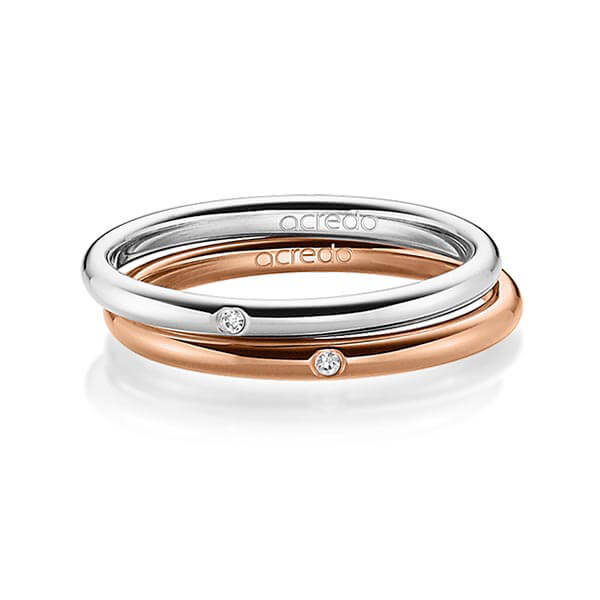 Set klassieke trouwringen in witgoud 14 kt. met in totaal 0,02 ct. Briljant tw/si van acredo