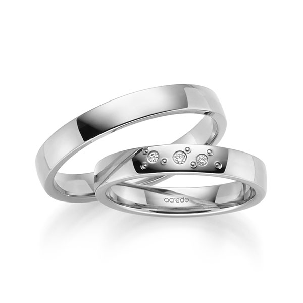 Set klassieke trouwringen in witgoud 14 kt. met in totaal 0,031 ct. Briljant tw/si van acredo