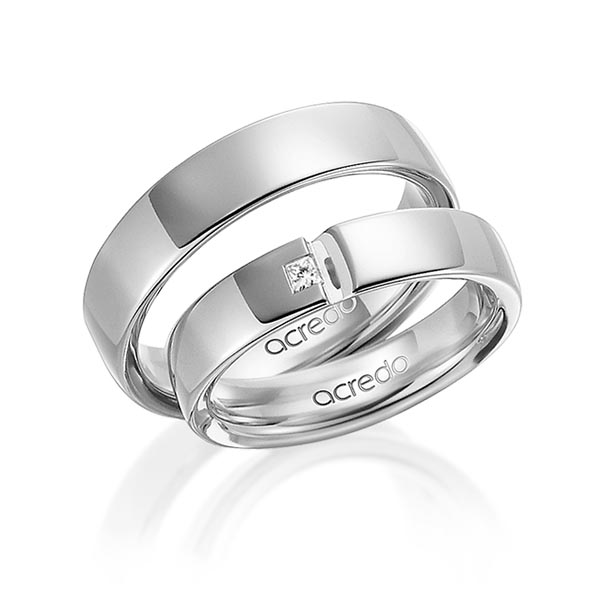 Set klassieke trouwringen in witgoud 14 kt. met in totaal 0,03 ct. Princess-Diamant tw/si van acredo