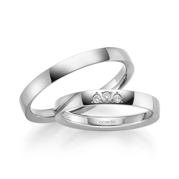 Set klassieke trouwringen in witgoud 14 kt. met in totaal 0,045 ct. Briljant tw/si van acredo