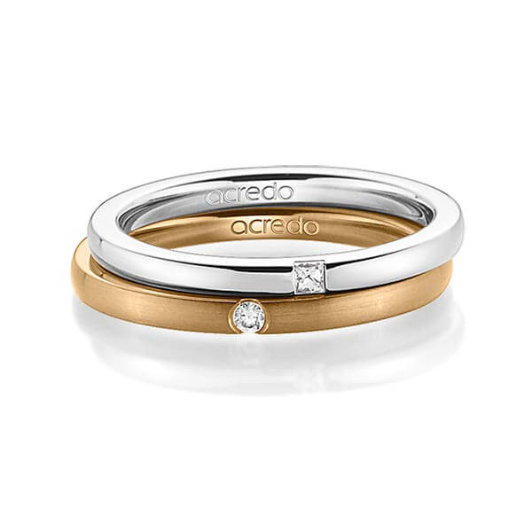 Set klassieke trouwringen in witgoud 14 kt. met in totaal 0,055 ct. Princess-Diamant & Briljant tw/si van acredo