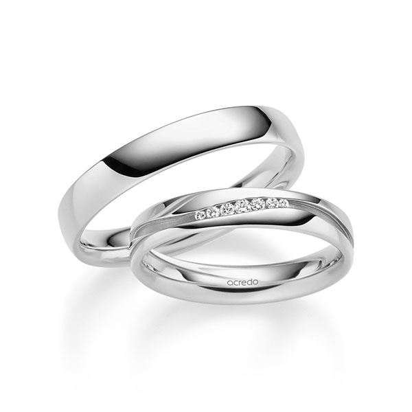 Set klassieke trouwringen in witgoud 14 kt. met in totaal 0,063 ct. Briljant tw/si van acredo