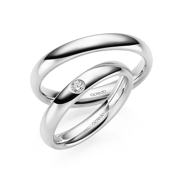 Set klassieke trouwringen in witgoud 14 kt. met in totaal 0,06 ct. Briljant tw/si van acredo