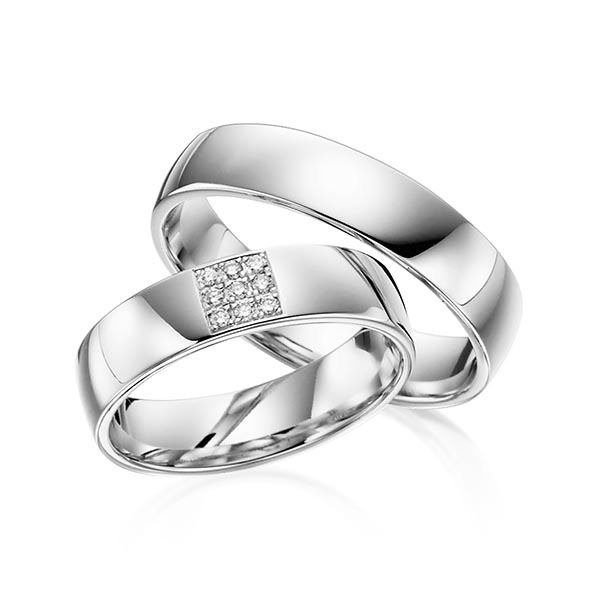 Set klassieke trouwringen in witgoud 14 kt. met in totaal 0,072 ct. Briljant tw/si van acredo