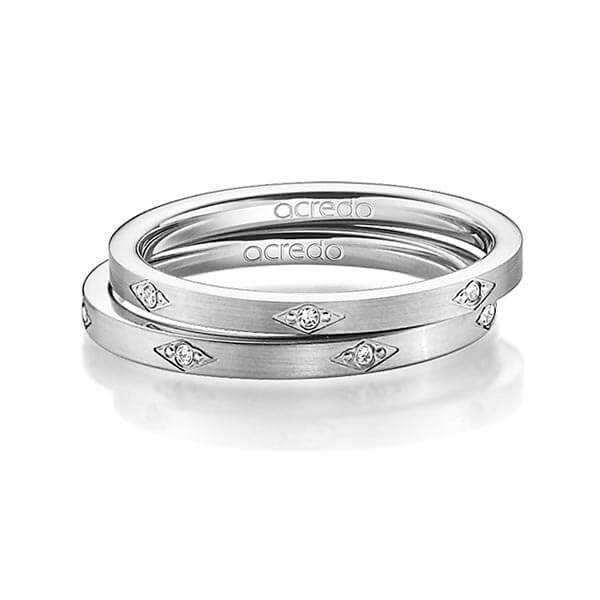 Set klassieke trouwringen in witgoud 14 kt. met in totaal 0,07 ct. Briljant tw/si van acredo