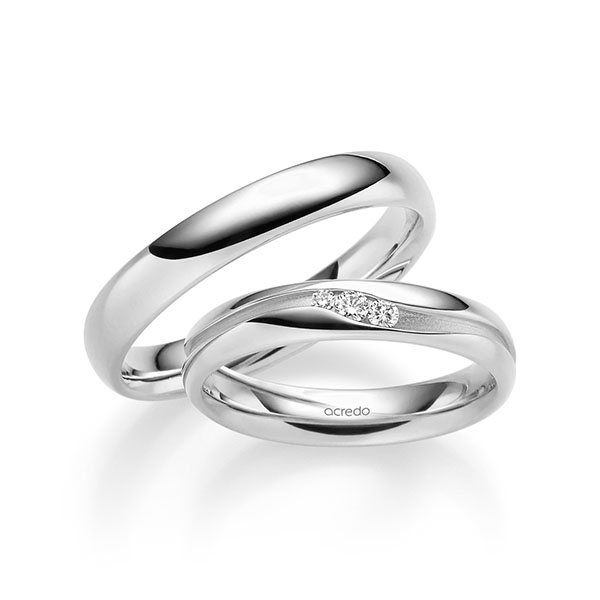 Set klassieke trouwringen in witgoud 14 kt. met in totaal 0,085 ct. Briljant tw/si van acredo