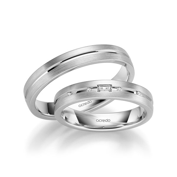 Set Klassieke trouwringen in witgoud 14 kt. met in totaal 0,08 ct. Briljant & Baguette-Diamant tw/si tw,vs van acredo - A-6003-7 Set Klassieke trouwringen in witgoud 14 kt. met in totaal 0,08 ct. Briljant & Baguette-Diamant tw/si tw,vs van acredo - A-6003-7