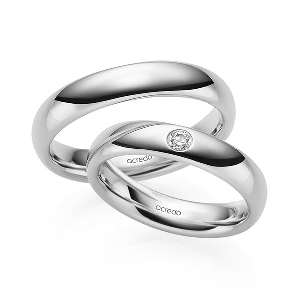 Set klassieke trouwringen in witgoud 14 kt. met in totaal 0,08 ct. Briljant tw/si van acredo