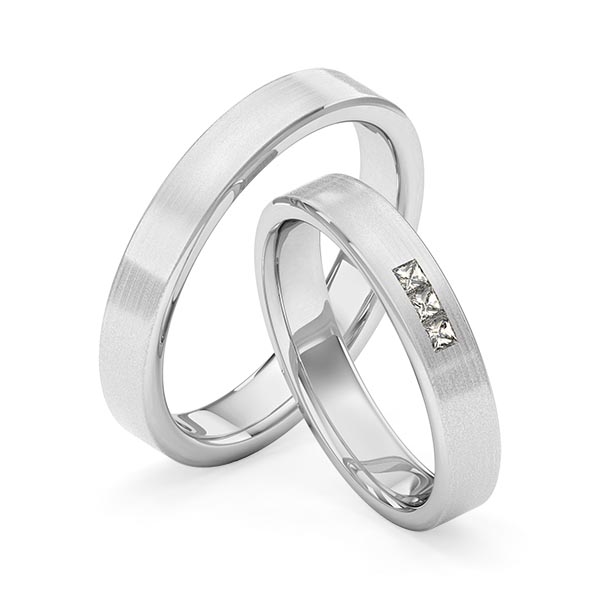 Set klassieke trouwringen in witgoud 14 kt. met in totaal 0,09 ct. Princess-Diamant tw,vs van Merii