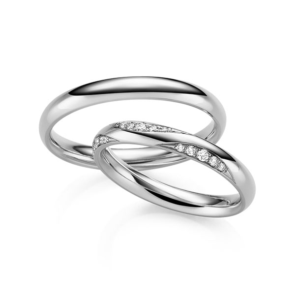 Set klassieke trouwringen in witgoud 14 kt. met in totaal 0,135 ct. Briljant tw/si van Eternal Touch