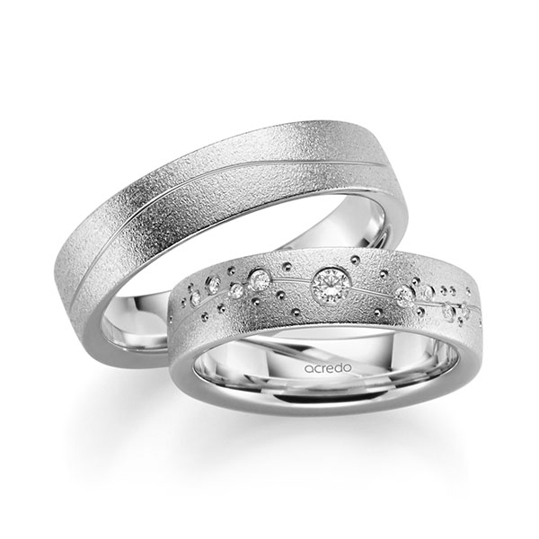 Set Klassieke trouwringen in witgoud 14 kt. met in totaal 0,136 ct. Briljant tw/si van acredo