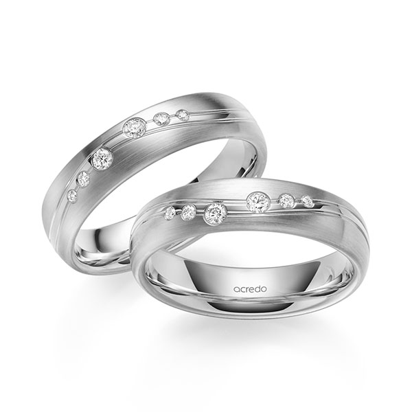 Set Klassieke trouwringen in witgoud 14 kt. met in totaal 0,18 ct. Briljant tw/si van acredo