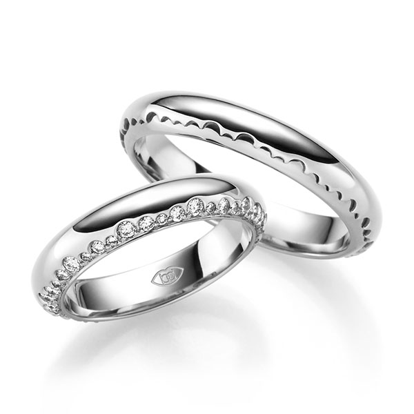 Set Klassieke trouwringen in witgoud 14 kt. met in totaal 0,6 ct. Briljant tw/si 