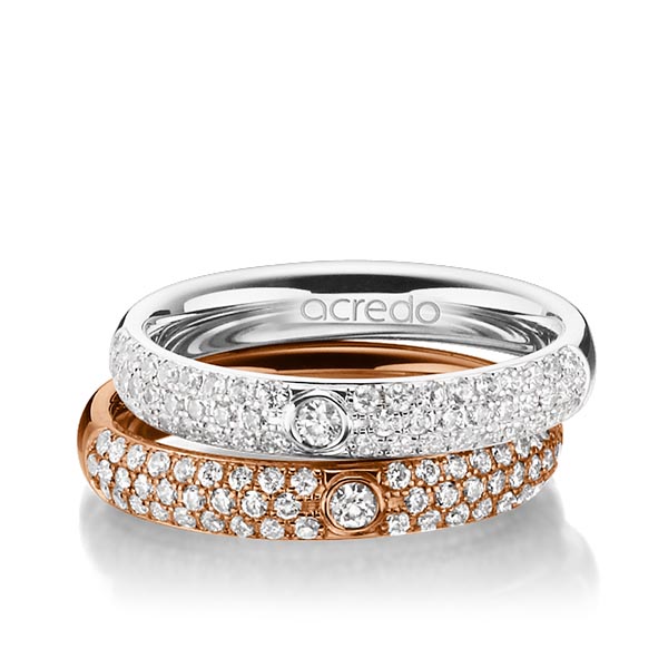 Set klassieke trouwringen in witgoud 14 kt. met in totaal 0,984 ct. Briljant tw/si van acredo