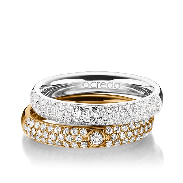 Set klassieke trouwringen in witgoud 14 kt. met in totaal 0,984 ct. Briljant tw/si van acredo