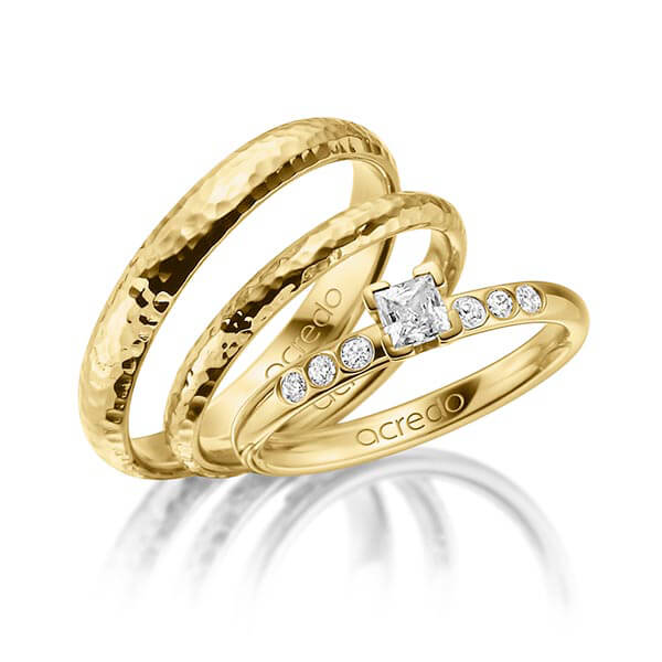 Tri-Set in geelgoud 14 kt. met in totaal 0,32 ct. Princess-Diamant tw,vs tw/si van acredo