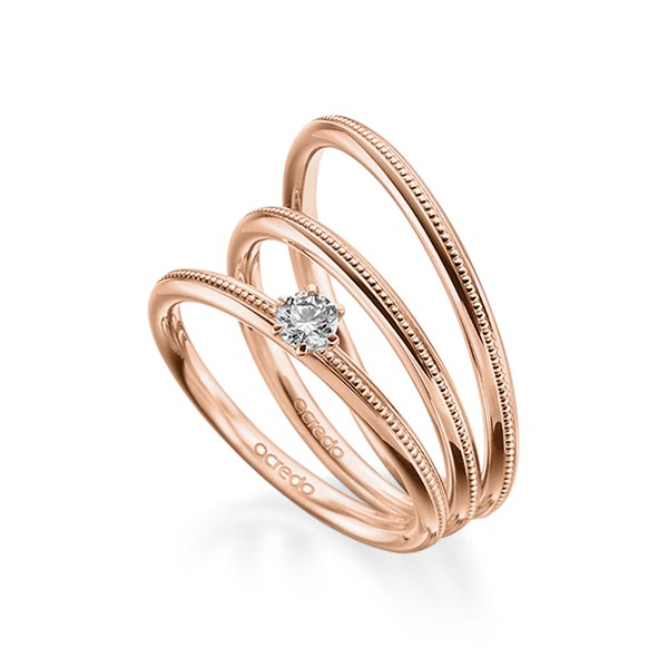 Tri-Set in roodgoud 14 kt. met in totaal 0,15 ct. Briljant tw/si van acredo