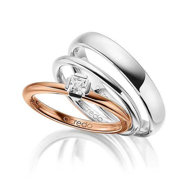 Tri-Set in roodgoud 14 kt. witgoud 14 kt. met in totaal 0,25 ct. Princess-Diamant tw/si van acredo