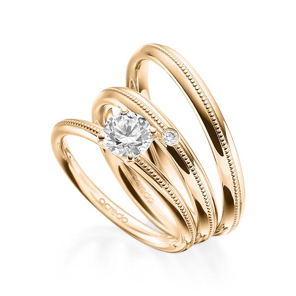 Tri-Set in roségoud 14 kt. met 0,7 ct. + in totaal 0,03 ct. Briljant tw/si van acredo