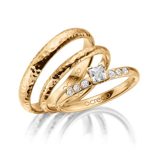 Tri-Set in roségoud 14 kt. met in totaal 0,32 ct. Princess-Diamant tw,vs tw/si van acredo