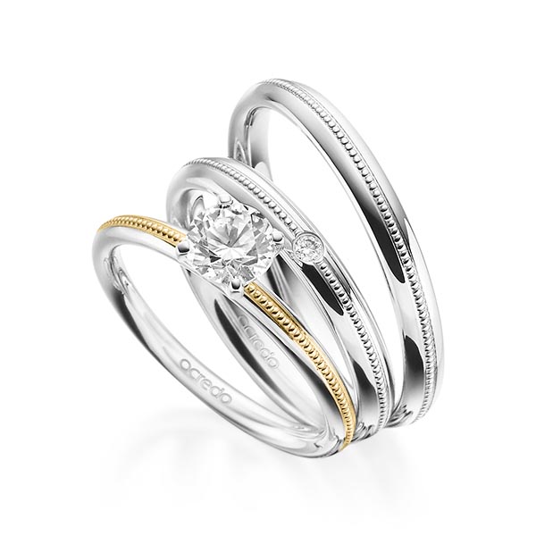 Tri-Set in witgoud 14 kt. geelgoud 14 kt. met 0,7 ct. + in totaal 0,03 ct. Briljant tw/si van acredo