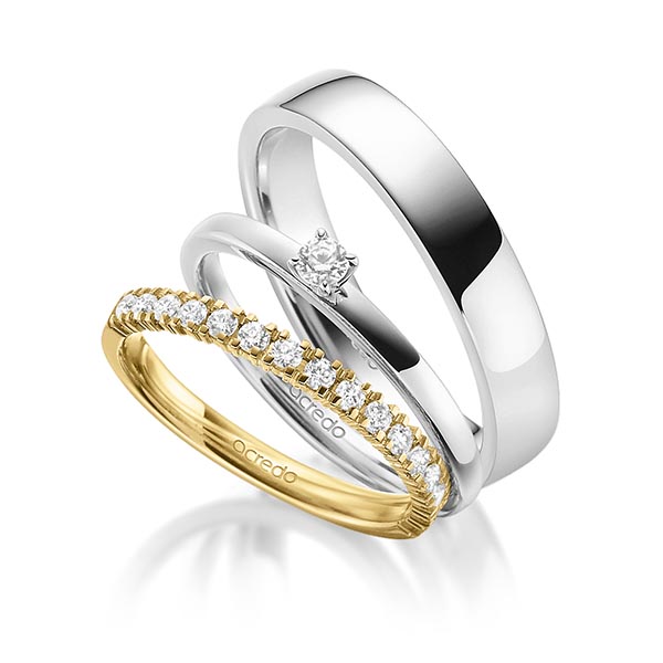 Triset in geelgoud 14 kt. half gezet met in totaal 0,45 ct. Briljant tw,vs tw/si van acredo
