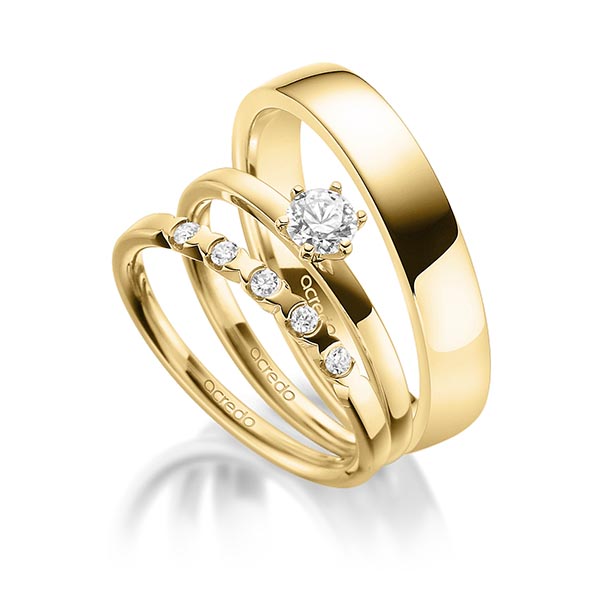 Triset in geelgoud 14 kt. met 0,3 ct. + in totaal 0,1 ct. Briljant tw,vs van acredo