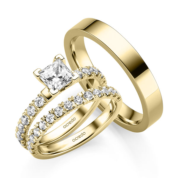 Triset in geelgoud 14 kt. met 0,7 ct. + in totaal 0,93 ct. Princess-Diamant & Briljant tw,vs tw/si van acredo