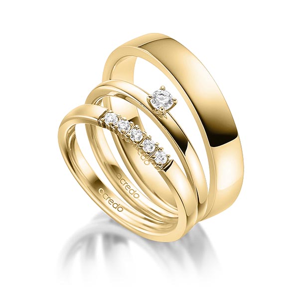 Triset in geelgoud 14 kt. met in totaal 0,25 ct. Briljant tw,vs tw/si van acredo