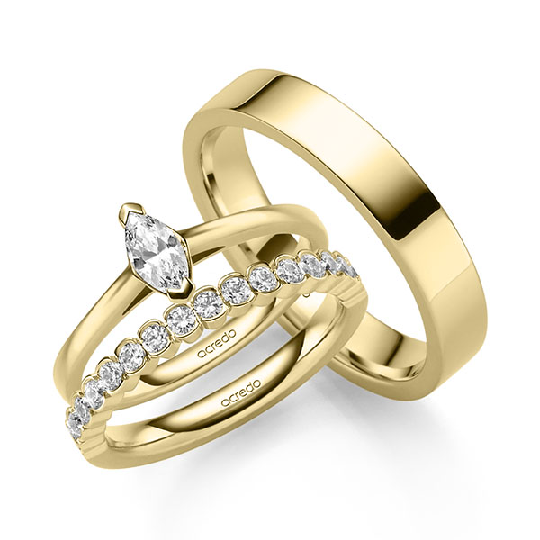 Triset in geelgoud 14 kt. met in totaal 0,71 ct. Briljant tw,vs tw/si van acredo
