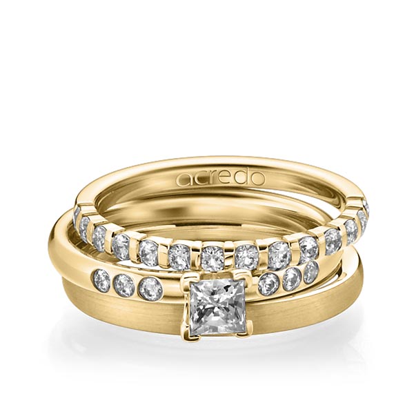 Triset in geelgoud 18 kt. half gezet met 0,4 ct. + in totaal 0,42 ct. Briljant & Princess-Diamant tw,vs tw/si van acredo