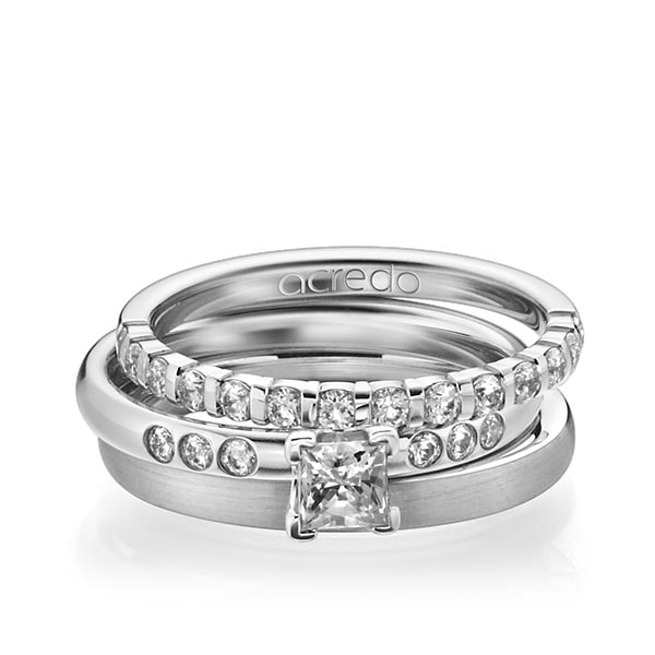 Triset in platina 950 half gezet met 0,4 ct. + in totaal 0,42 ct. Briljant & Princess-Diamant tw,vs tw/si van acredo
