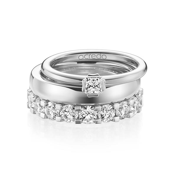 Triset in platina 950 met in totaal 3,29 ct. Princess-Diamant & Briljant tw/si tw,vs van acredo