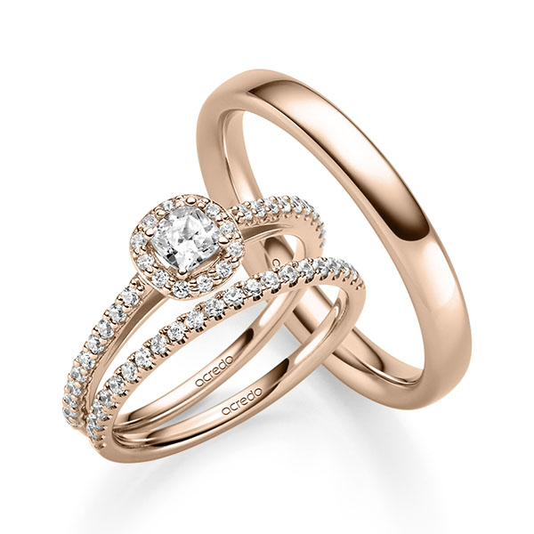 Triset in roodgoud 14 kt. met 0,3 ct. + in totaal 0,504 ct. Briljant tw,vs tw/si van acredo