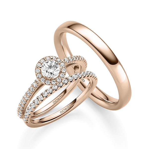 Triset in roodgoud 14 kt. met 0,3 ct. + in totaal 0,518 ct. Briljant tw,vs tw/si van acredo