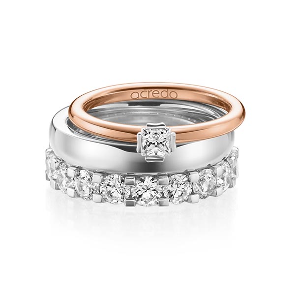 Triset in roodgoud 18 kt. witgoud 18 kt. met in totaal 3,29 ct. Princess-Diamant & Briljant tw/si tw,vs van acredo