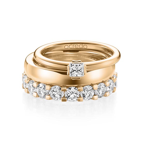 Triset in roségoud 14 kt. met in totaal 3,29 ct. Princess-Diamant & Briljant tw/si tw,vs van acredo