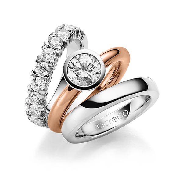Triset in Weissgold 585 halbausgefasst mit 1 ct. + zus. 1,5 ct. Brillant tw, vs von acredo