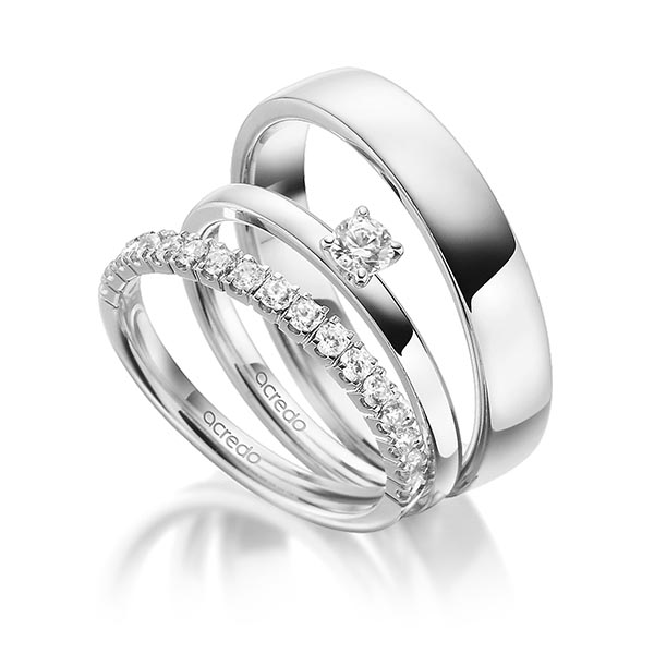 Triset in Weißgold 585 halbausgefasst mit zus. 0,52 ct. Brillant tw, vs von acredo