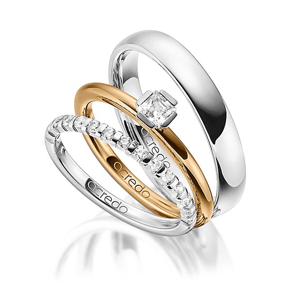 Triset in Weissgold 585 halbausgefasst mit zus. 0,64 ct. Brillant & Prinzess-Diamant tw, vs tw, si von acredo