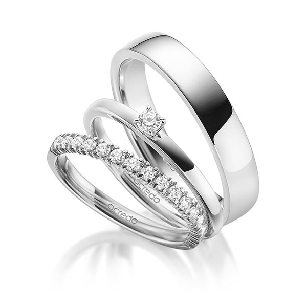 Triset in witgoud 14 kt. half gezet met in totaal 0,45 ct. Briljant tw,vs tw/si van acredo